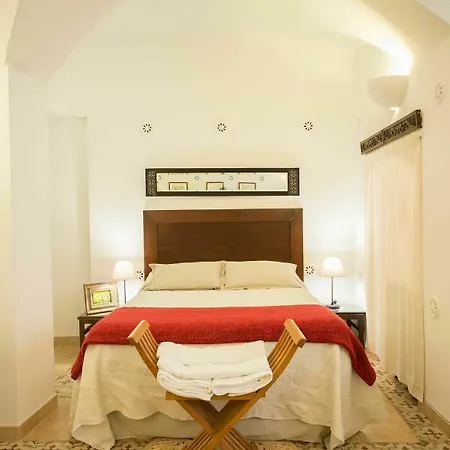 Adarve Caceres
